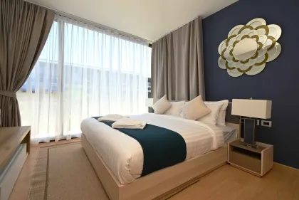 Luxury 2-Bedroom Beachfront Condo at Baan Mai Khao, Sansiri