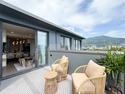 2 спальни, 2 ванные в кондоминиуме The Deck Patong с бассейном и видом на горы