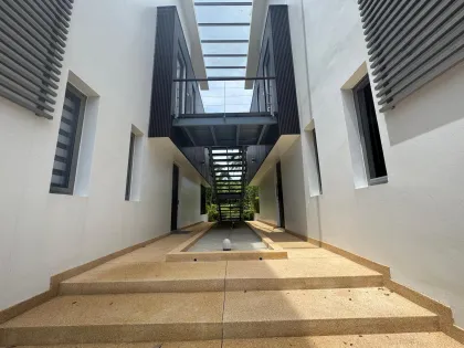 Residencia Lotus Gardens con acceso al jardín en venta